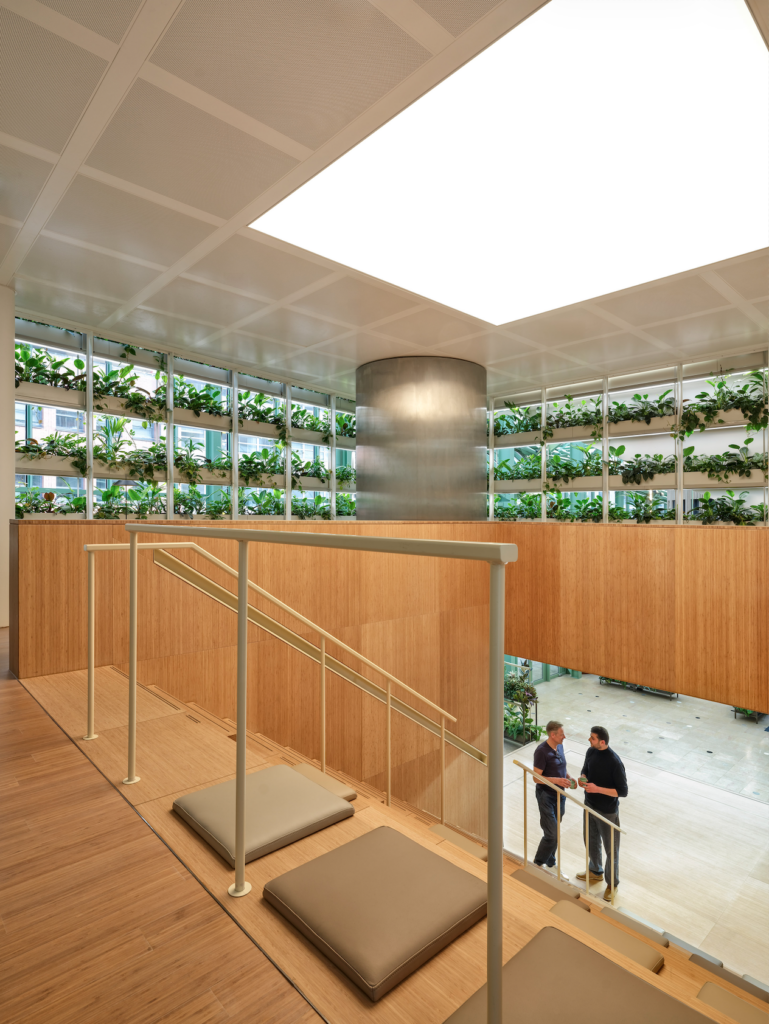 Office interior at Rijkskantoor B73 with integrated planting and circular biophilic design