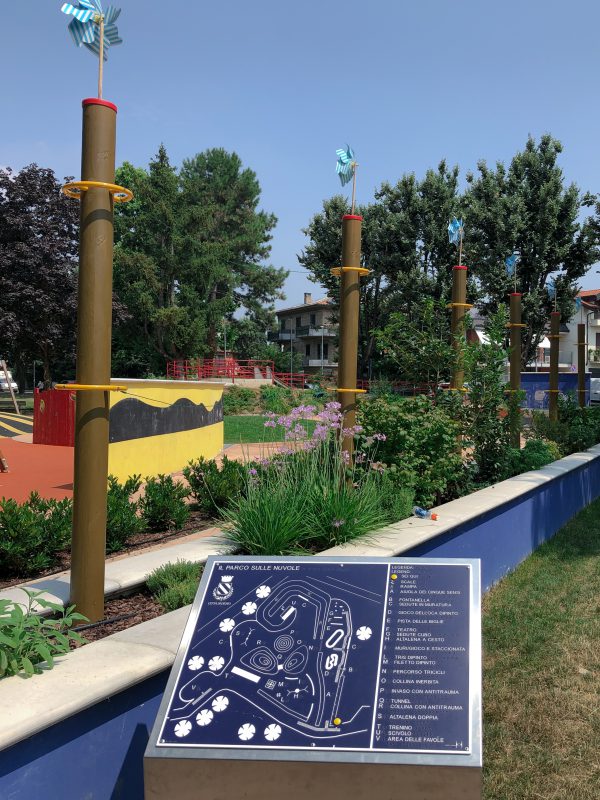 Outdoor playground with integrated planting and natural elements supporting biodiversity and play